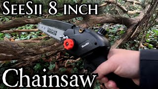 SeeSii 8 inch Chainsaw review  mini Rechargeable Cordless Chainsaw test in the Woods [upl. by Ashely]