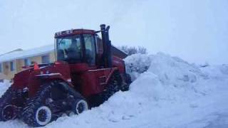 pushing snow case ih steiger stx535 quadtrac leon 4000 6 way blade [upl. by Jerrilyn500]