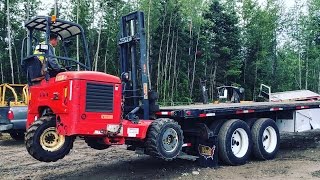 LOADING MOFFETT PIGGYBACK ON FLATBED TRAILER [upl. by Ynitsed]