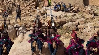 Dogon warriors performing their masked dance ceremony [upl. by Hanser]