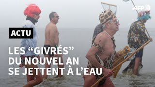 Nouvel An traditionnel bain pour quotles givrésquot de MalolesBains  AFP News [upl. by Iseabal]