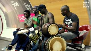 African Drummers playing Djembe drums in Paris Subway  How to play drums [upl. by Weinshienk]