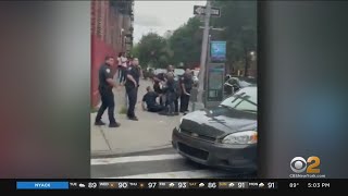 Video shows crowd throwing bottles at cops in the Bronx [upl. by Haleigh]