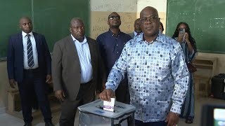 DR Congo President Felix Tshisekedi votes in Kinshasa  AFP [upl. by Montagna]