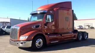 Peterbilt 579 80quot Sleeper 2016 Sunburst Orange  Peterbilt Trucks Grand Rapids [upl. by Rebliw]