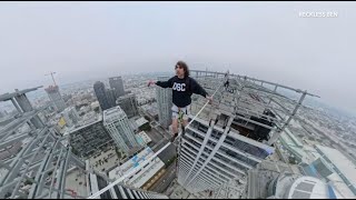 Daredevil walks between downtown LA skyscrapers high above city skyline [upl. by Nnoj304]