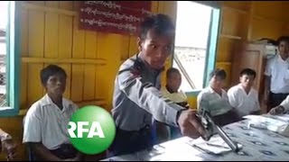 Gunwaving police officer goes viral in Myanmar [upl. by Aivila321]