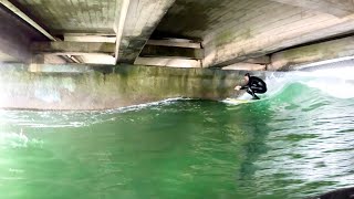 Surfing RARE under bridge Novelty wave [upl. by Yvonne]