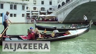 Antitourism sentiment grows in overcrowded Venice [upl. by Ayet531]