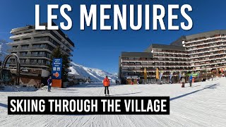 Skiing through Les Menuires village in Les 3 Vallees [upl. by Tychonn]