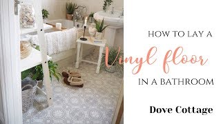 How to lay vinyl flooring in a bathroom DIY tutorial [upl. by Anertal920]