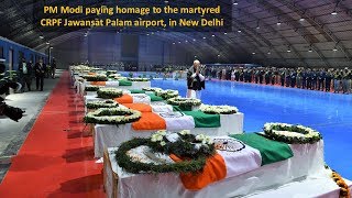 PM Modi paying homage to the martyred CRPF Jawans at Palam airport in New Delhi [upl. by Amikehs701]