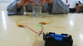 AWESOME Physics demonstrations Pure water or distilled water does not conduct electricity [upl. by Hara318]