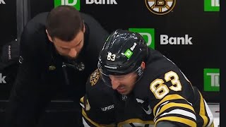 Brad Marchand Injured After Hit From Sam Bennett [upl. by Holly-Anne443]