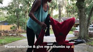 Folding The Joovy Caboose Ultralight Graphite Stroller [upl. by Ethel771]