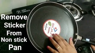 How to remove sticker from non stick pan  नान स्टिक पैन से स्टीकर हटाने का आसान तरीका [upl. by Ahsemal]