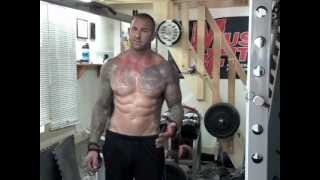 BehindTheBack Dumbbell Shrug by Jim Stoppani [upl. by Aikaj]