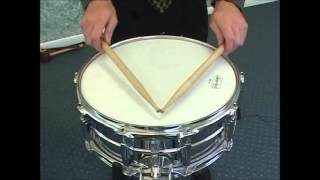 DPM  1  Beginning Snare Drum Lessons Grip and Basic Strokes [upl. by Aifas819]