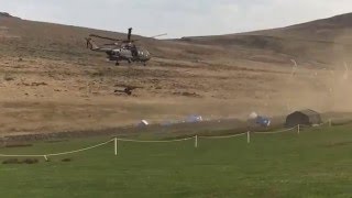 Merlin Helicopter downwash blows over portable toilets [upl. by Oiluj]