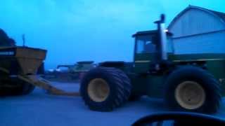 John Deere 8850 pulling Miskin DW 25 wagons loaded [upl. by Ennirac]