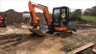 Mini Excavator working with very wet mud [upl. by Eon]