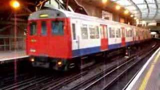 Metropolitan tube train leaves Farringdon station [upl. by Ecirted]