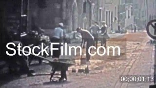 1966 Man repairing cobblestone road with old country techniques HAMBURG GERMANY [upl. by Holden]