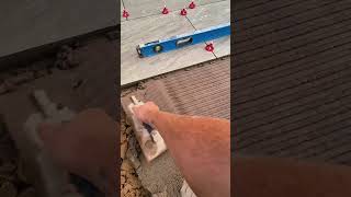 Spreading the perfect bed 🙌 diy tips howto help ideas patio paving float tile fyp fypage [upl. by Lay]