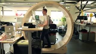 This guy built himself a human hamster wheel for the ultimate standing desk [upl. by Lomasi785]