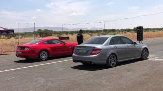 Ford Mustang GT 50 vs C63 AMG [upl. by D'Arcy]