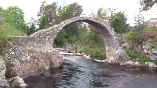 The famous historic 1719 built stone packhorse bridge at Carrbridge Highland Scotland [upl. by Aiket]