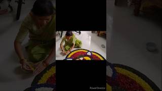 Navratri special flower rangoli design flowerdecoration flowerrangoli flower viralshort [upl. by Ymor568]