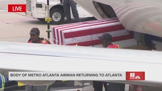 US Airman Roger Fortsons body arrives at Atlanta airport [upl. by Ealasaid419]