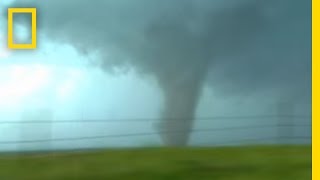 Tornadoes Lightning in Rare Video  National Geographic [upl. by Harrak]