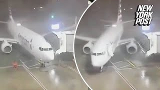 American Airlines plane pushed from gate by 80 mph gusts at Dallas Fort Worth Airport wild video [upl. by Henri]