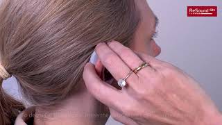 Adjust the volume for your BTE BehindtheEar hearing aid [upl. by Specht]