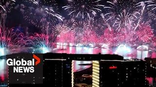 New Year’s 2023 Dubai skies light up with drones fireworks in recordbreaking bid [upl. by Aokek]