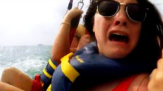 Vacationers Spot Sharks in Water While Parasailing [upl. by Aidnahs]