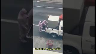 Chinese Couple Are Put Into A Metal Container To Be Quarantined [upl. by Kcirdaed]