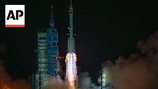 China launches new crew to its orbiting space station [upl. by Ahsotan53]