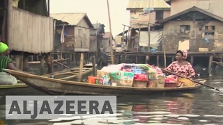 Residents of Nigerias floating slum thrive [upl. by Adieno]