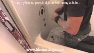 How to remove tub fiberglass shower enclosure demo tearout Small bathroom remodel [upl. by Kristoforo]