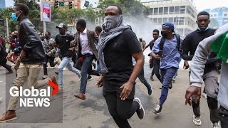 Kenya protests Police fire tear gas water cannon at antitax demonstrators [upl. by Nnylylloh]