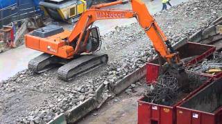 Hitachi EX330 excavator loading rebar [upl. by Newby]