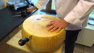 opening a wheel of parmesan cheese parmigiano reggiano [upl. by Nnaed891]