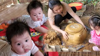 single mother with many children  making a clay oven cooking and taking care of the children [upl. by Yeffej]