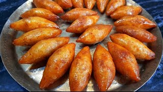 Mug Puli Pitha  সেরা স্বাদের মুগ পুলি পিঠা রেসিপি  Bengali Pithe Puli Recipe  Moong Shamli Pitha [upl. by Elletnuahs]