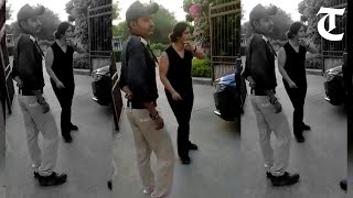 Viral video shows woman manhandling abusing security guard at society in Noida booked [upl. by Ekaj159]