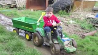 Kids playing on tractors digging amp shovelling mud children on the farm TRACTOR SONG [upl. by Nylaehs]