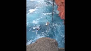 Cliff diving at South Point crazy swell [upl. by Haidabez153]